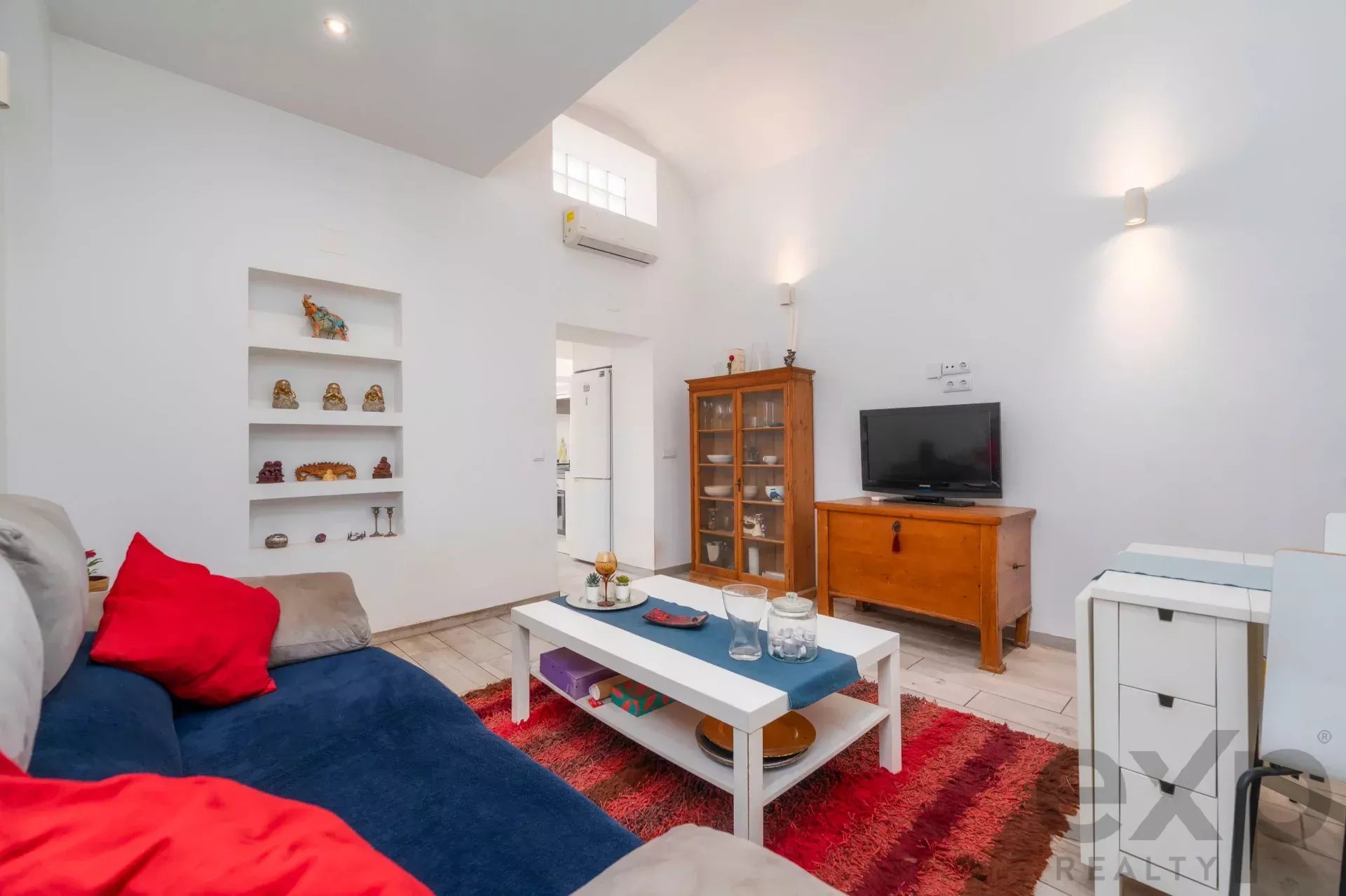 Traditional two-bedroom townhouse with huge terrace, completely renovated in the centre of Olhão.