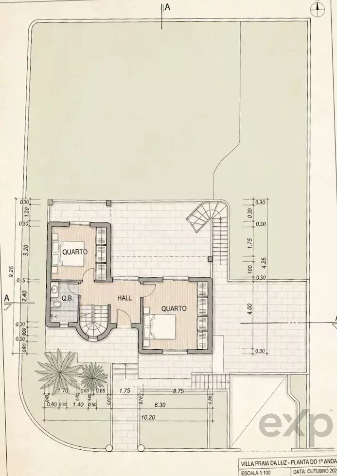 Architectural floor plan of a villa showing two bedrooms, a hall, a bathroom, a curved staircase, an outdoor terrace, and surrounding garden areas.