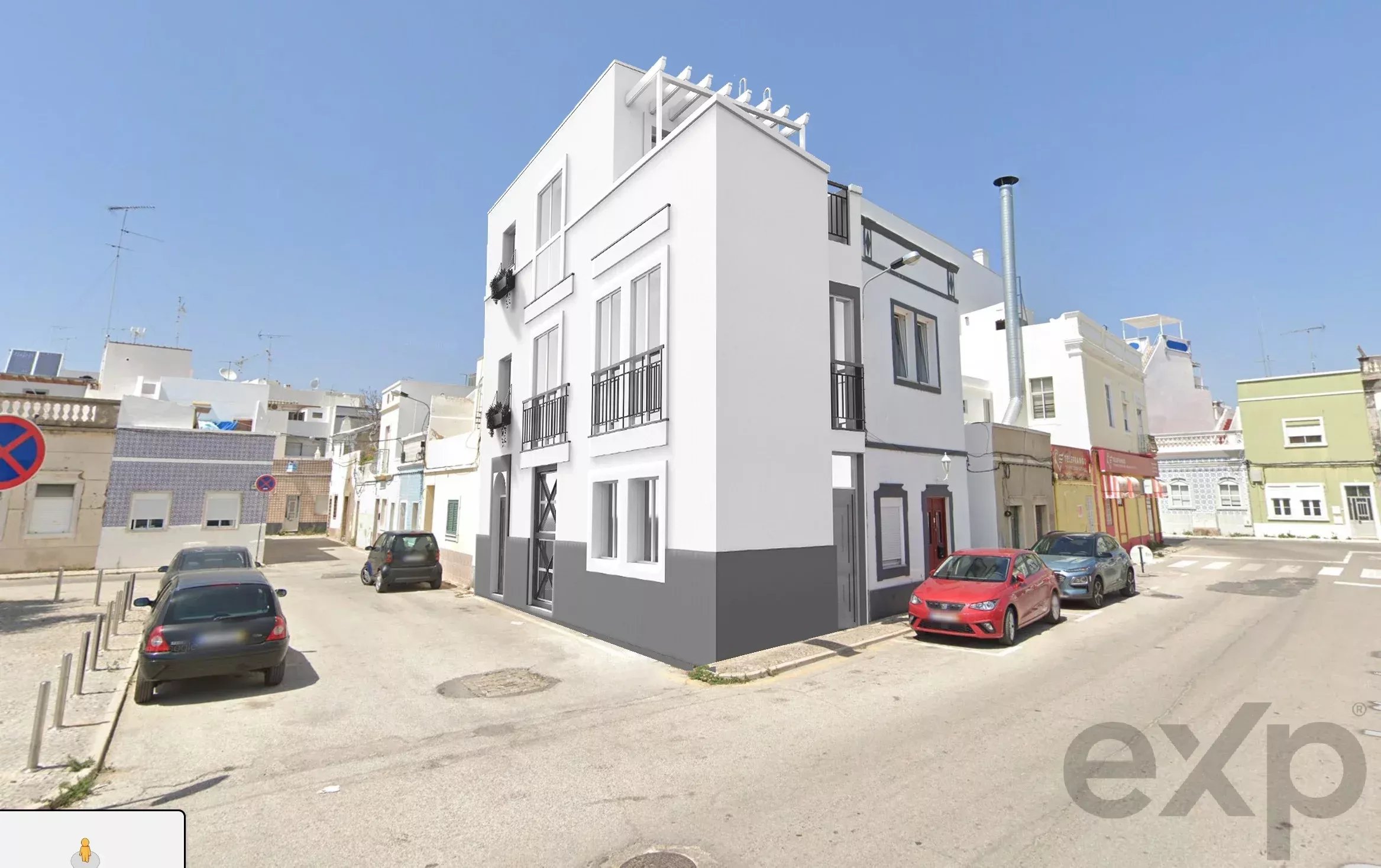 White corner building with multiple windows and small balconies on a sunny urban street, neighboring pastel houses under a clear blue sky (architectural render/edit).