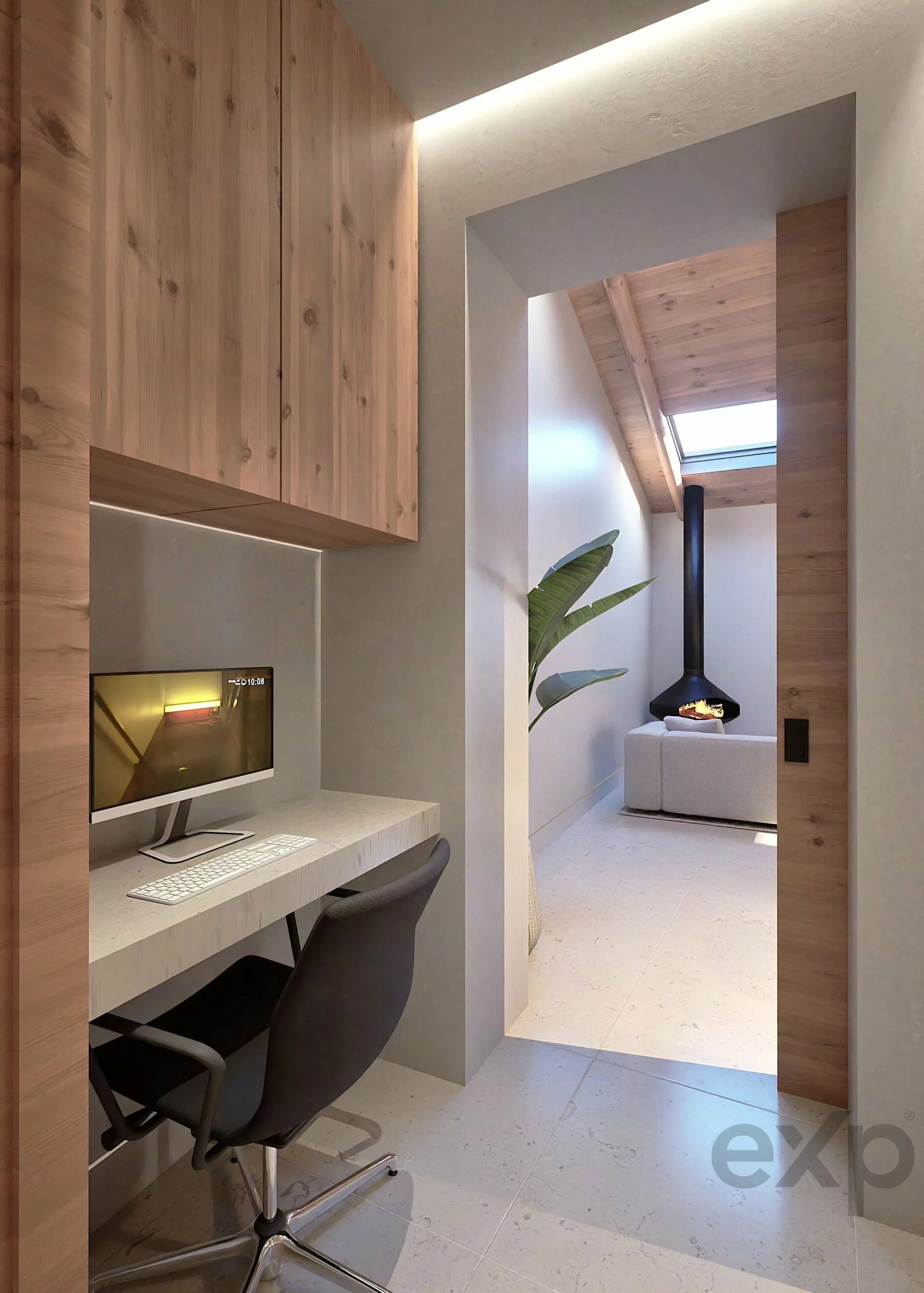 Home office nook with a wall-mounted wooden cabinet above a light-colored desk and computer, in a modern, wood-accented interior. In the distance, an open doorway leads to a living area with a hanging fireplace and skylight, along with a tall plant adding greenery.