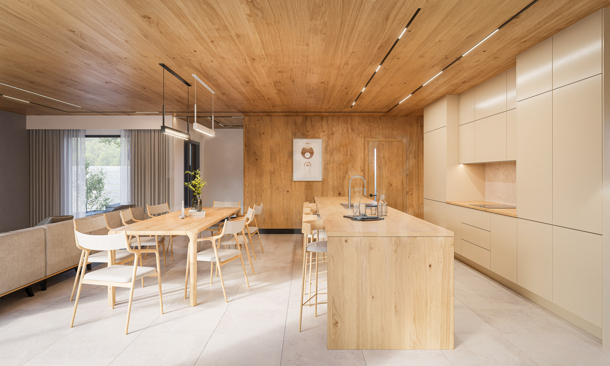 Open-plan dining and kitchen area with a long wooden table, pale chairs, timber ceiling, and beige cabinetry along the wall.