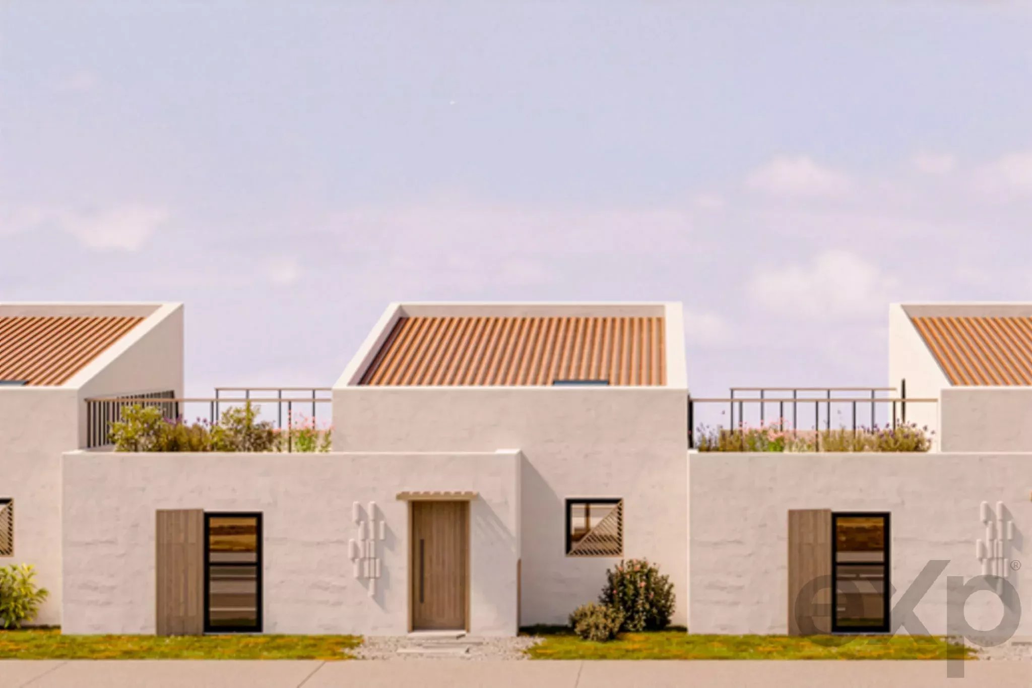 Row of white modern townhouses with orange wooden slatted roofs and small front gardens.