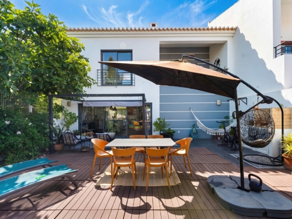 Garden terrace of a four-bedroom family house in Sargacal, Lagos, the kind of home buyers are weighing ahead of Portugal's 2027 State Budget
